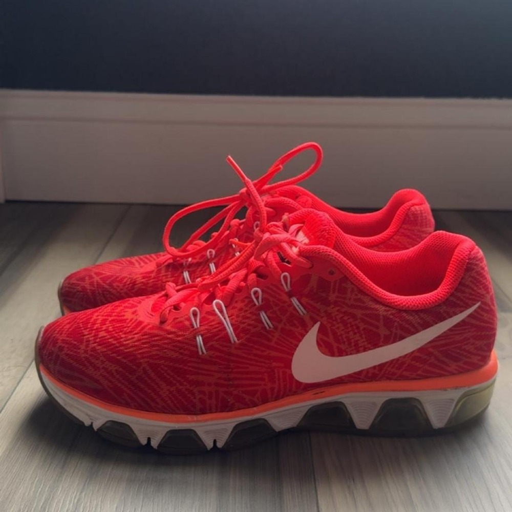 Nike Free 5.0 red sneakers with white Nike swoosh